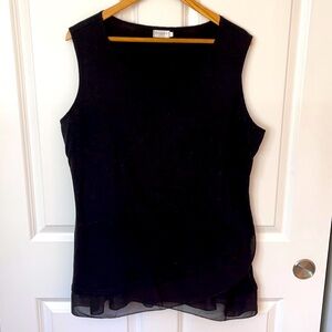 Sleeveless blouse with sheer details
